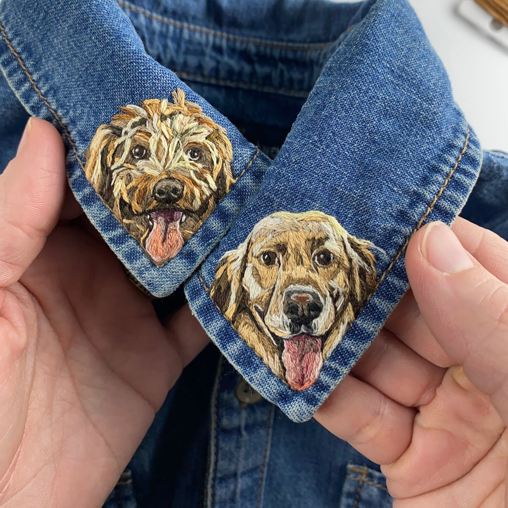 Embroidery of two dogs on a collar