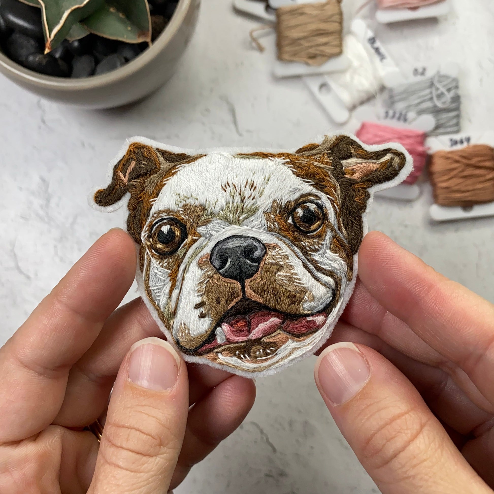 Patch of a dog smiling with its tongue out