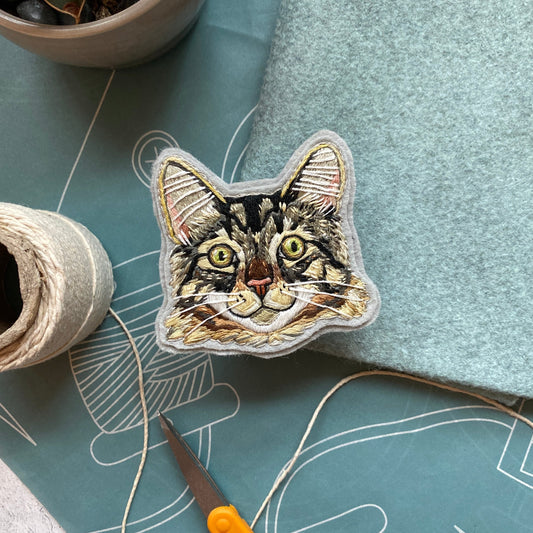 Embroidered tabby patch