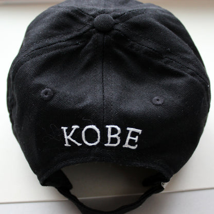 The name "Kobe" embroidered on the back of cap